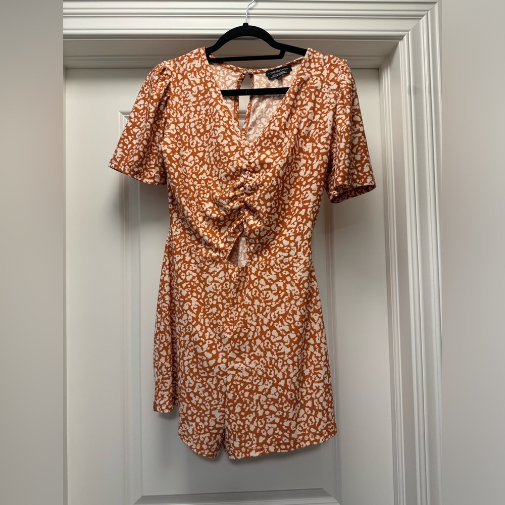 Cute Wednesdays girl romper size small with cutout. So comfy and lightweight.